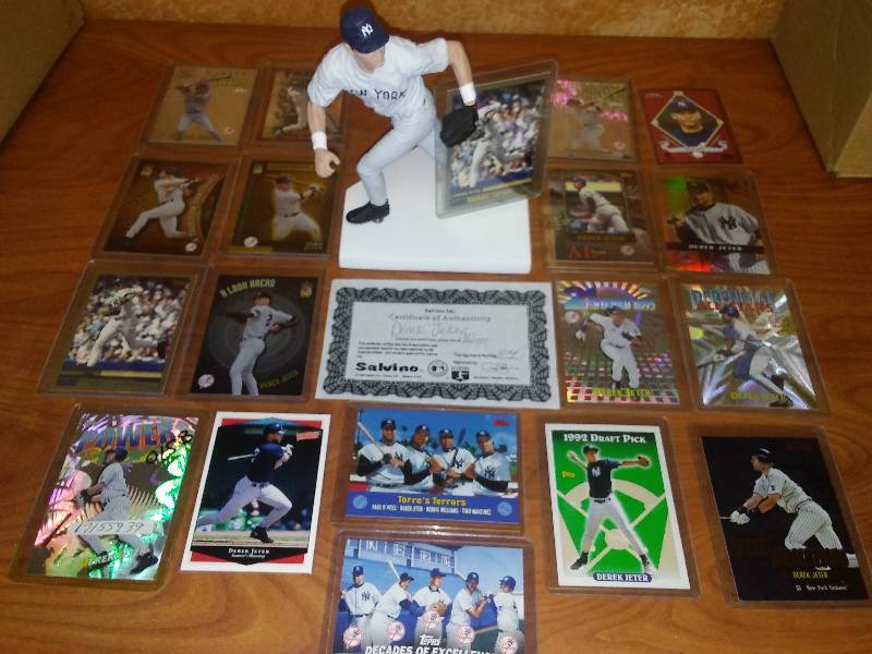 lot 35 image: Derek Jeter Statue  Rookie Card plus 17.