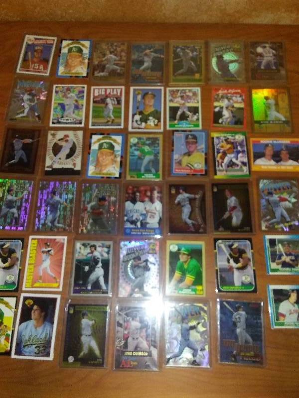 lot 78 image: 28 McGuire and 14 Conseco Cards