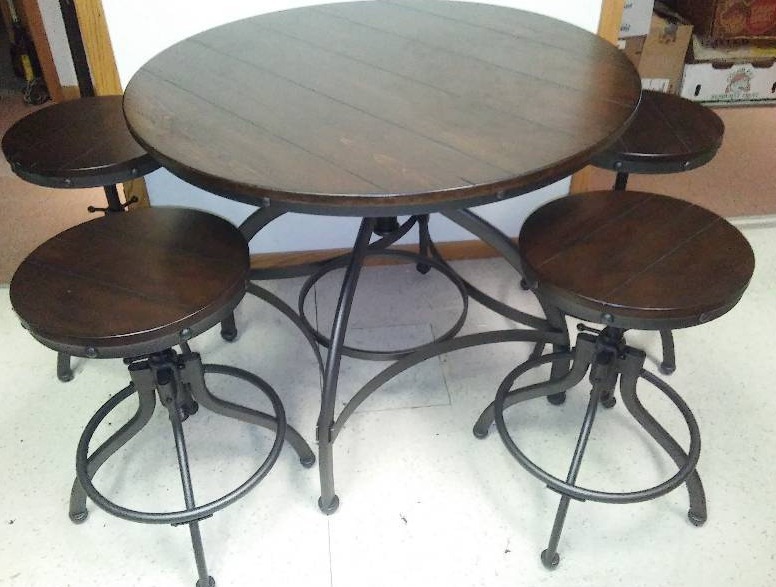 Round Table and Stools (4) 36 in. Diameter and adjusts from 30 to 40 in. high