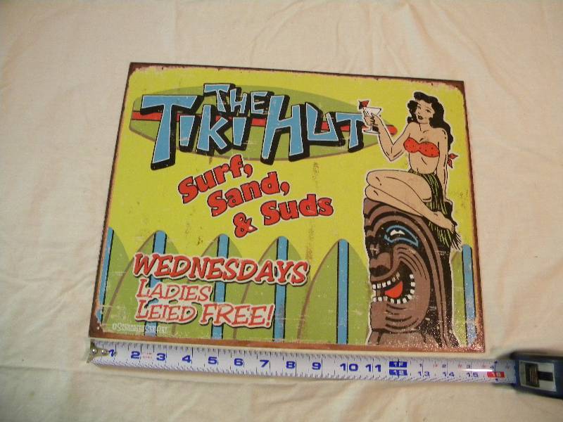 The Tiki Hut Metal Sign