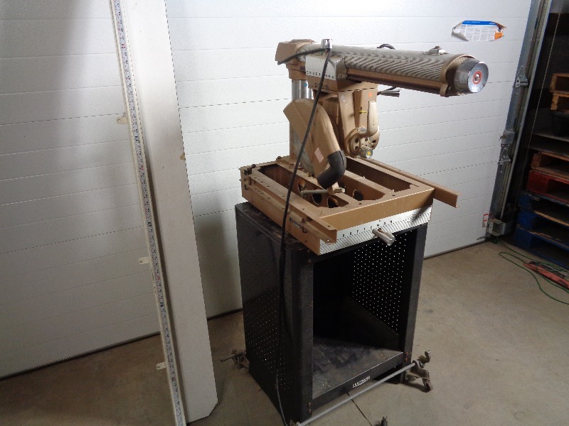 lot 11 image: Craftsman Radial Arm Saw On Cabinet