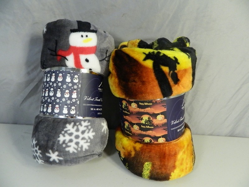 lot 8 image: 2 New Holiday Throws