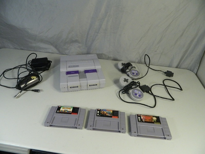 lot 57 image: Super Nintendo Console, Games, More