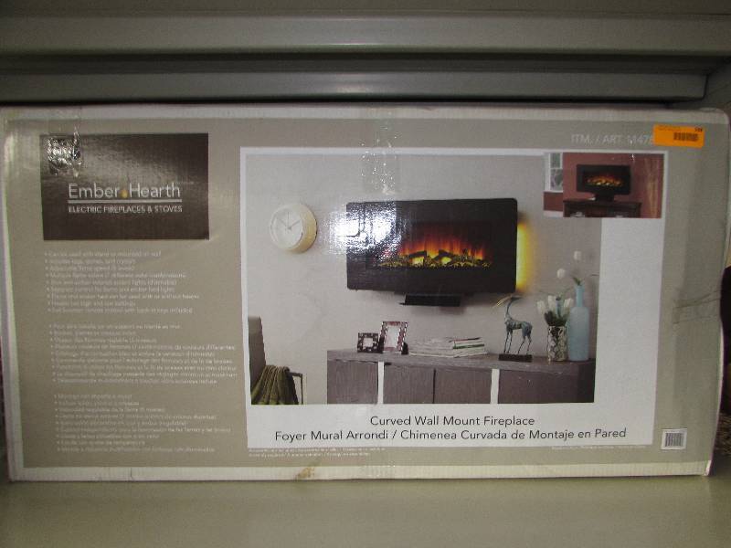 lot 598 image: CURVED WALL MOUNT FIREPLACE, MSRP $99.99
