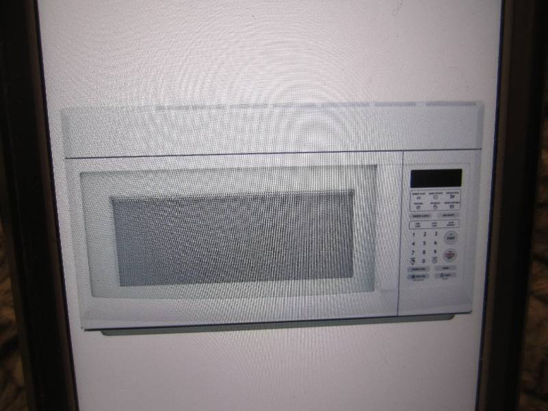 lot 2 image: Magic Chef 1.6 Cu Ft Over the Range...