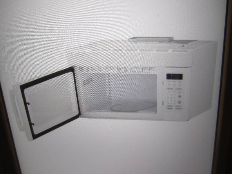 lot 3 image: Magic Chef 1.6 Cu Ft Over the Range...