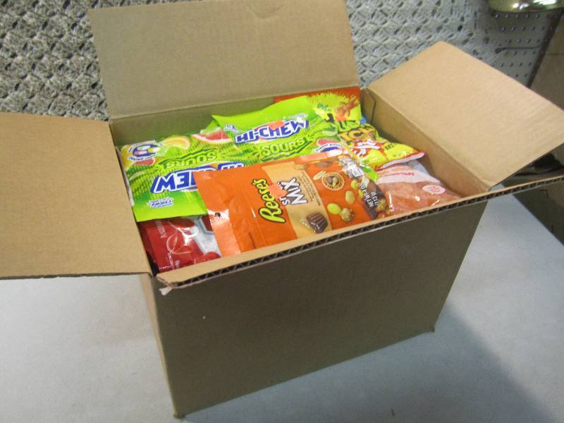 lot 49 image: Box Full Mixed Bags of Various Cand...