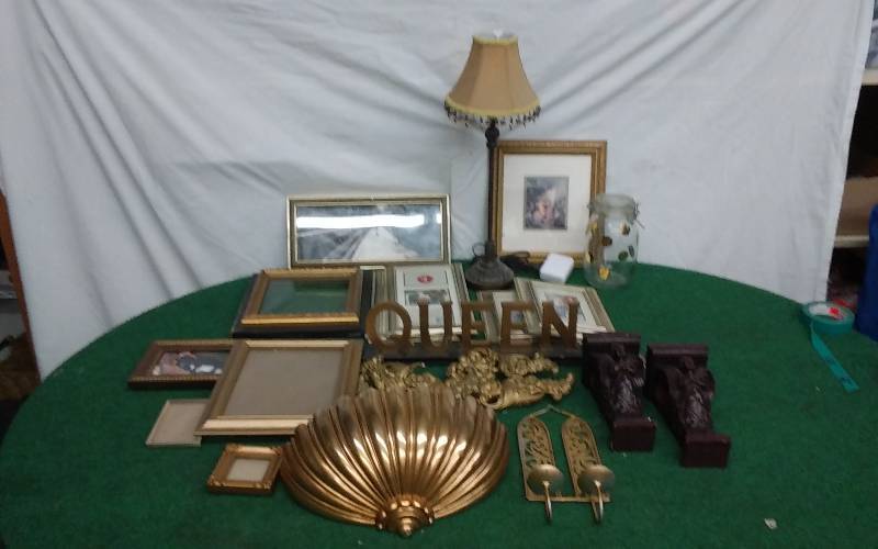 lot 28 image: Large Box Lot Of Gold & Cherub Decor, Lamp With Beaded Shade, Siroco Lava Bow