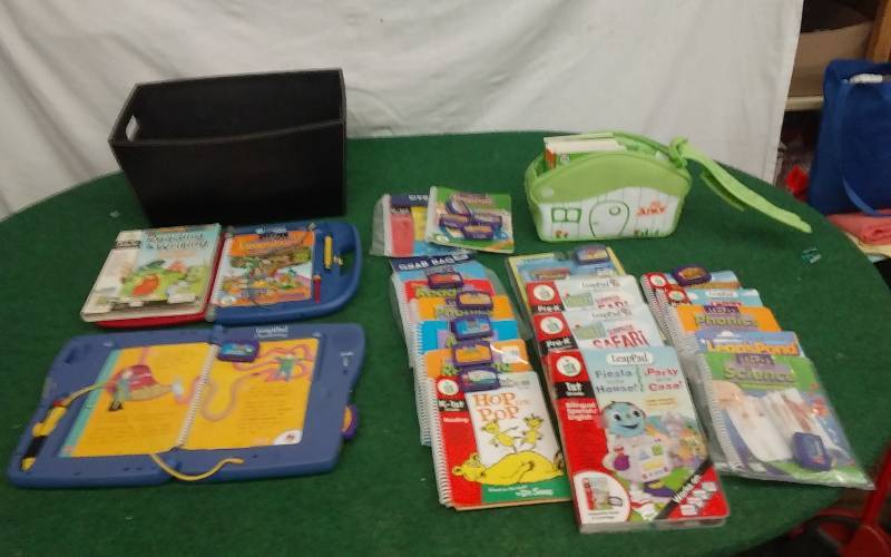lot 57 image: Leap Frog Leap Pads, Assorted Books & Cartridges