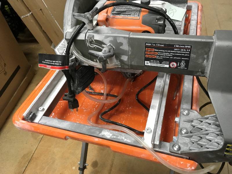 lot 58 image: Rigid 7 in 9 amp Wet Tile Saw in good working condition