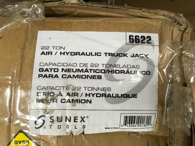 lot 134 image: Sunex 22-Ton AirHydraulic Truck Jack  Model# 6622 open box never used
