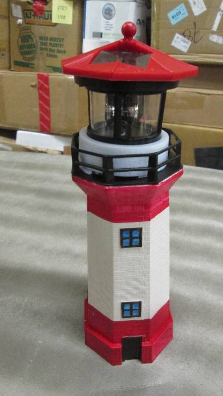 lot 203 image: Solar Lighthouse untested...