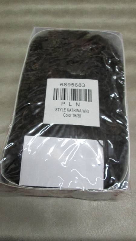 lot 232 image: Ashro Captivating Katrina Wig Retai...