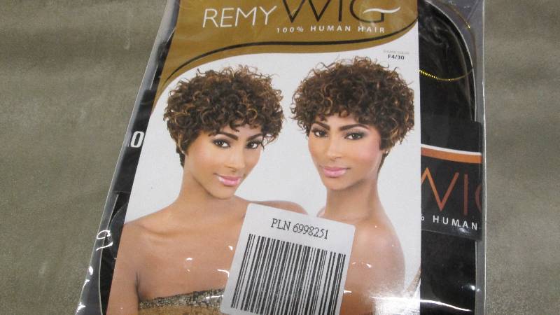 lot 235 image: MotownTress Remy Wig Retail $79.99...