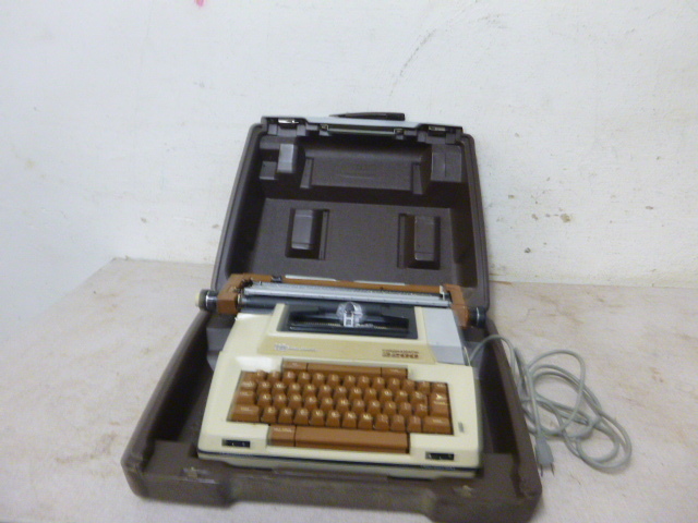 lot 55 image: Smith-Corona Portable Electric Typewriter