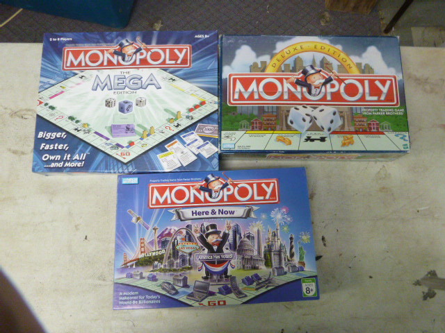 lot 202 image: 3 Monopoly Games