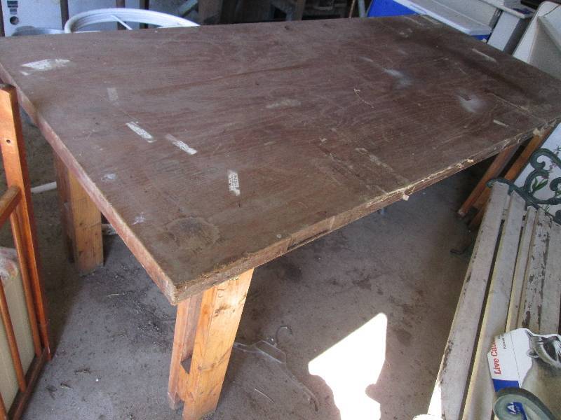 lot 304 image: Table made from a solid wood door. ...