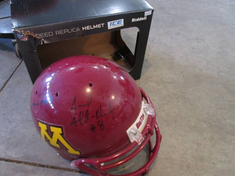 lot 92 image: Minnesota Gophers autographed helme...