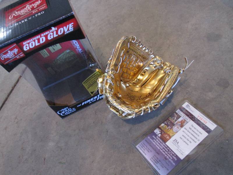 lot 101 image: Tony Oliva autographed gold glove...
