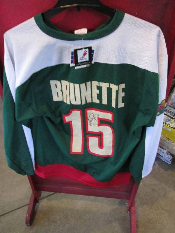 lot 119 image: Autographed Brunette jersey...