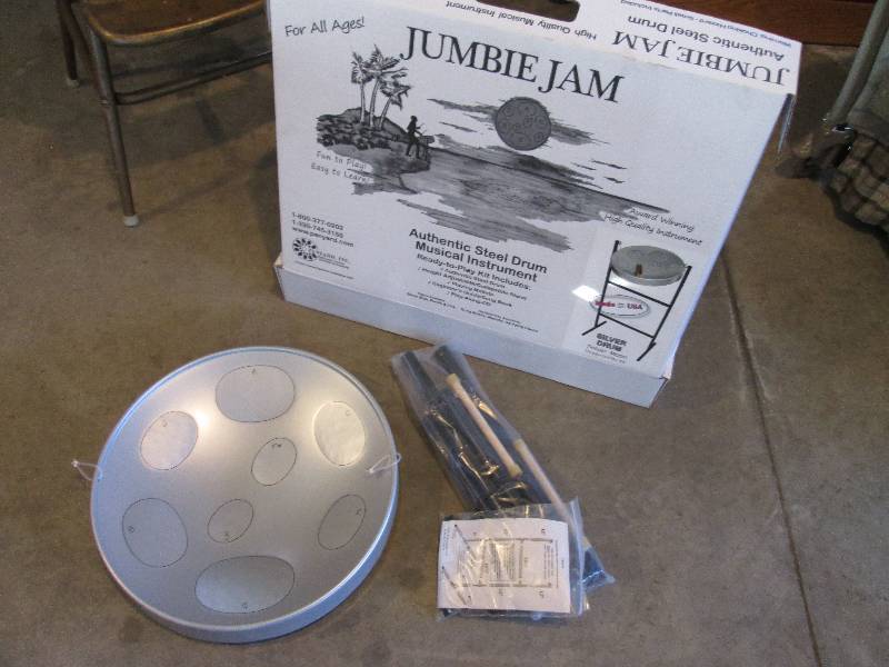 lot 144 image: New Jumbie Jam steel drum kit...