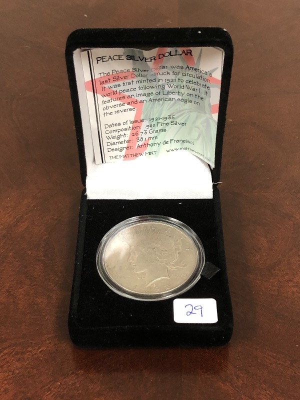 lot 29 image: 1922 Peace Silver Dollar With Displ...