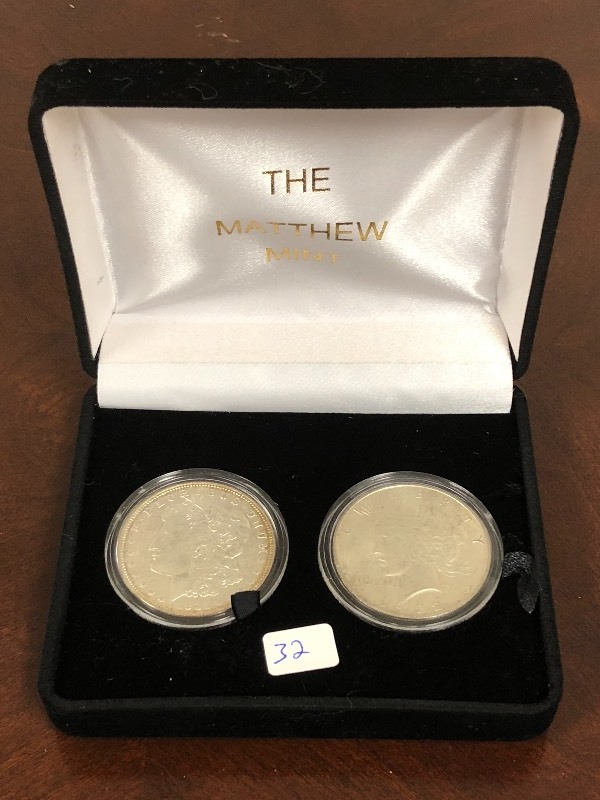 lot 32 image: The Matthew Mint 2-Piece Silver Dol...