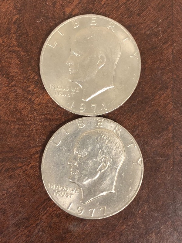 lot 101 image: (1) 1971 & (1) 1977 Eisenhower Doll...