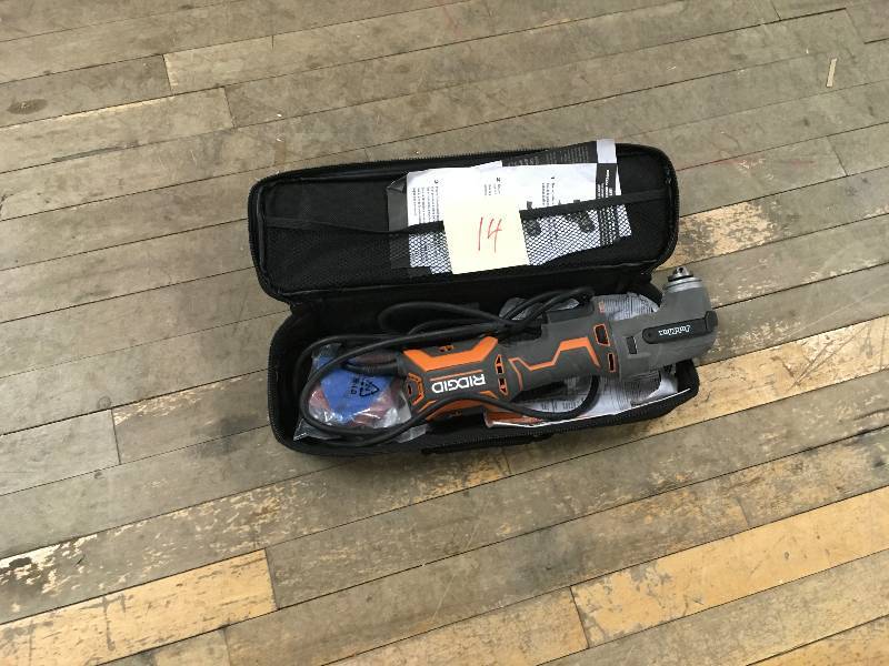 lot 14 image: Ridgid 4 Amp Multi-Tool with Tool Free Head DeWalt Laser used in working codition