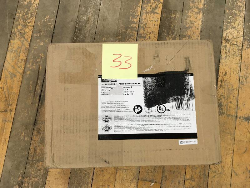 lot 33 image: Ridgid 18-Volt Cordless 13-2 in. Compact DrillDriver Kit n  like new condition