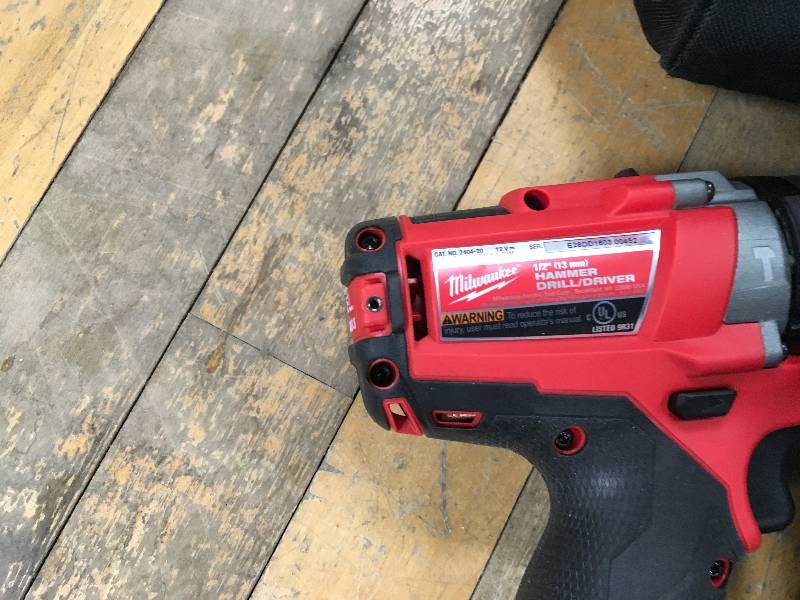 lot 35 image: Milwaukee M12 Hammer DrillDriver Kit in very good working condition