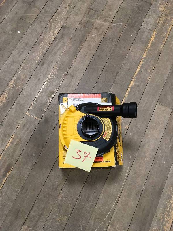 lot 37 image: DeWalt 5  Surface Grinding Dust Shroud in  like new condition