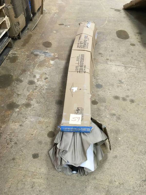 lot 59 image: Patio Table Tan Umbrella not used