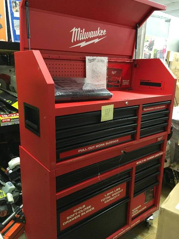 lot 111 image: Milwaukee 46 in. 16-Drawer Tool Chest and Rolling Cabinet Set, Red and Black not used slight damage see pictures