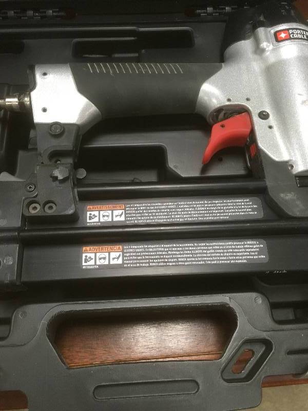 lot 12 image: Porter Cable 18 Gauge Pneumatic Brad Nailer Kit in working conditions