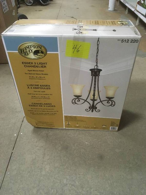 lot 46 image: Hampton Bay Essex 3 Light Aged Black Chandelier with Tea Stained Glass Shades Not used