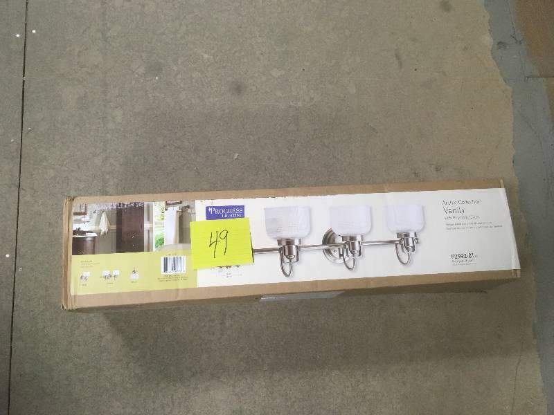 lot 49 image: Progress Lighting Archie Collection 3 Light Antique Nickel Vanity Light with Clear Polished Glass Shades in good conditions
