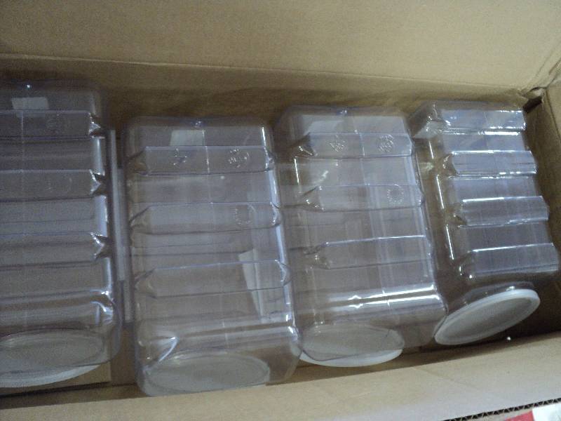 4 plastic canisters...