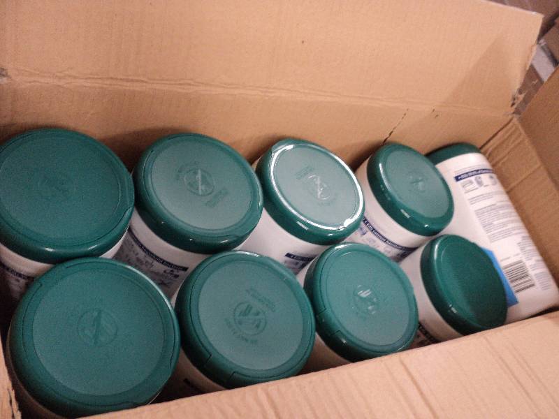 2 boxes of Tech wipes and 11 canist...