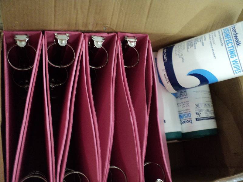 6 pink vinyl folders and 5 canister...