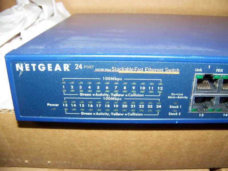 lot 83 image: (5) Netgear, 24-port, 10100 Mbps, Stackable Fast Ethernet Switches