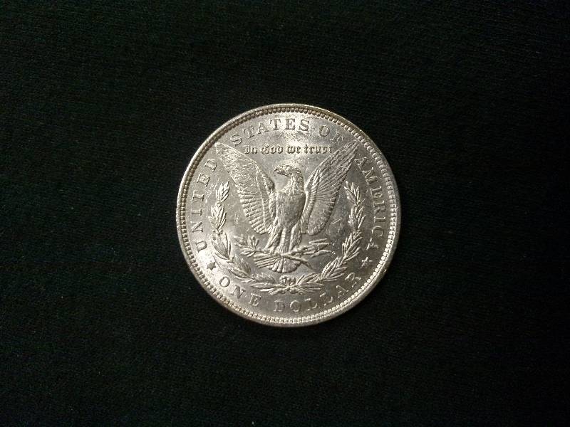 lot 2 image: 1879 Morgan Silver Dollar...