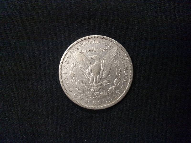 lot 3 image: 1879 Morgan Silver Dollar...