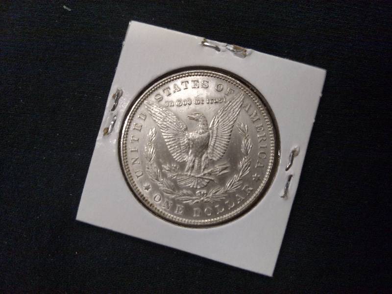 lot 11 image: 1882 Morgan Silver Dollar...