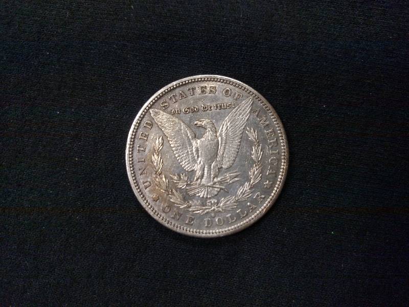 lot 13 image: 1882 S Morgan Silver Dollar...