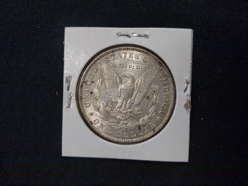 lot 20 image: 1886 Morgan Silver Dollar...