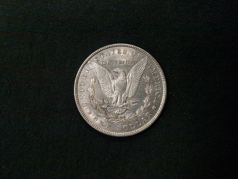 lot 22 image: 1886 Morgan Silver Dollar...