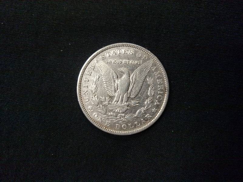 lot 25 image: 1887 O Morgan Silver Dollar...