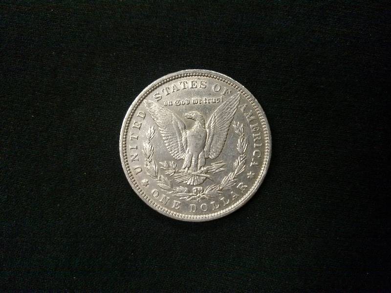 lot 30 image: 1889 O Morgan Silver Dollar...