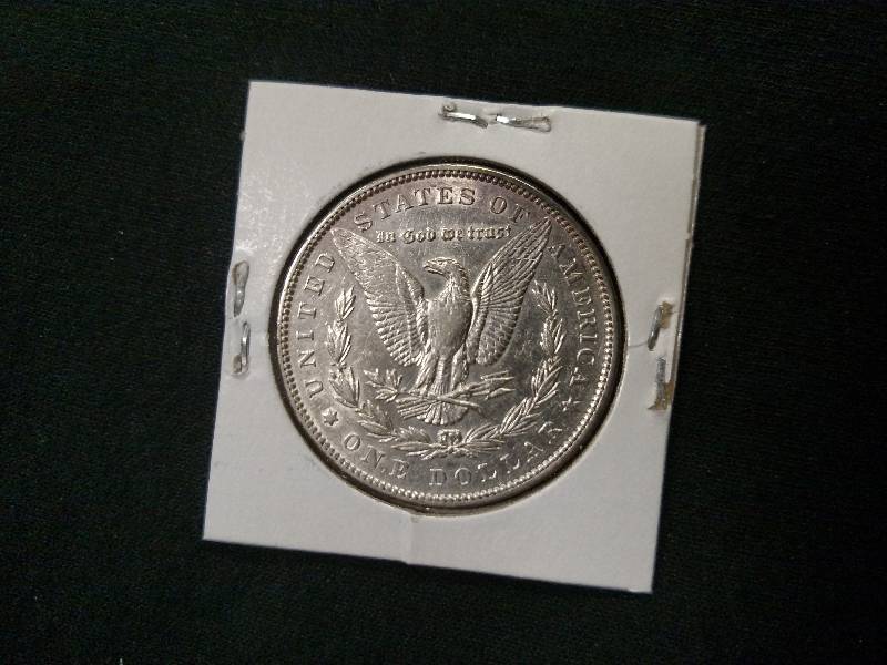 lot 31 image: 1890 Morgan Silver Dollar...
